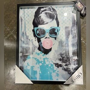 Louis Vuitton monogram is in the landscape of this whimsical piece of artwork